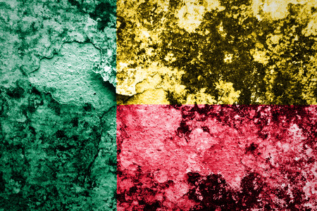 Grungy Benin flag on concrete wall の写真素材