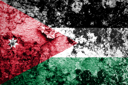 Jordanian flag painted on grunge wall の写真素材