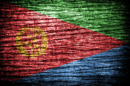 Eritrea Flag on old wood background の写真素材