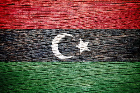 Libya Flag on old wood background の写真素材