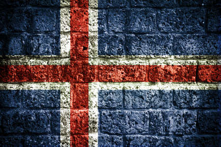 Iceland flag on old brick wallの写真素材