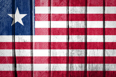 Liberia Flag on wood background の写真素材