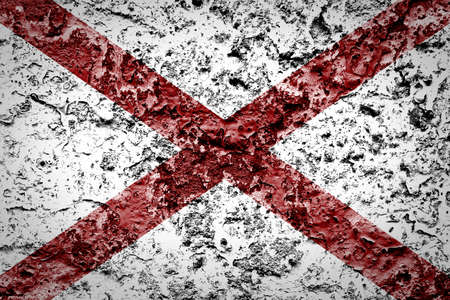 Alabama State Flag painted on grunge wall の写真素材
