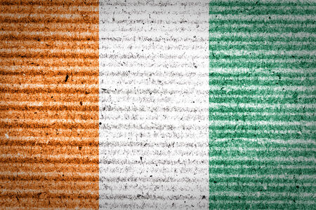 Grungy Ivory Coast flag paint on a cardboard box の写真素材