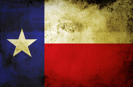 Grunge Texas state Flag on a grunge paper の写真素材