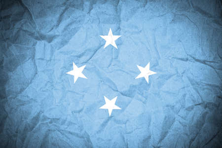 Micronesia flag on crumpled paper の写真素材