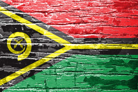 Vanuatu Flag painted on old wood background の写真素材