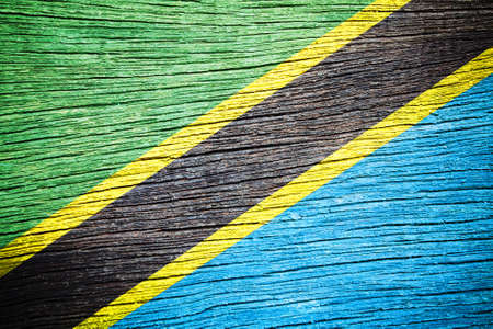 Tanzania Flag on old wood backgroundの写真素材