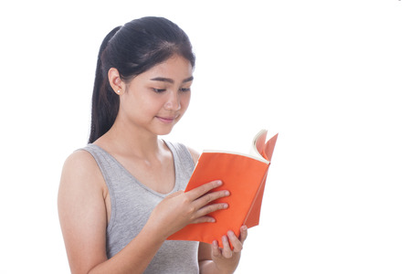 young women reading a bookの写真素材