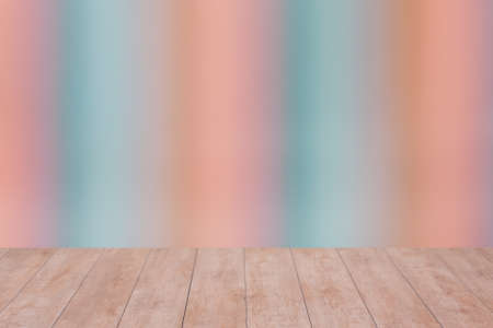 Wood table top on color abstract blurred background. ready for product display
