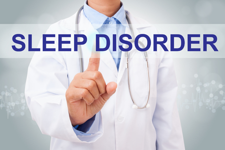 Doctor hand touching SLEEP DISORDER sign on virtual screen. medical conceptの写真素材
