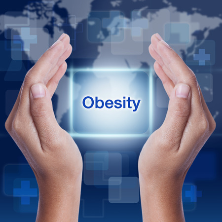 obesity word button on screen. medical conceptの写真素材