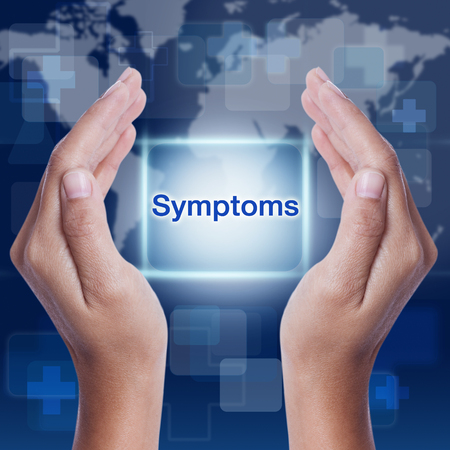 symptoms word button on screen. medical conceptの写真素材