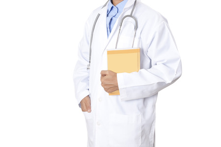 Doctor holding notebook with stethoscope on white background.の写真素材