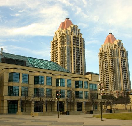 just after sunrise, some of the lights in the courtyard are still on.の写真素材