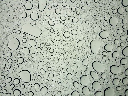 Waterdrops against clear surface