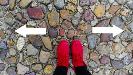 Boots on the cobbled lane, turn left or turn rightの写真素材