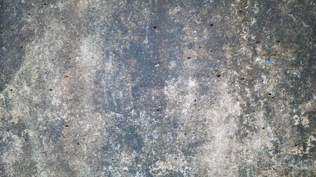 Cement wall with black spotsの写真素材