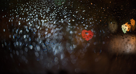 abstract blur blackground with heart bokeh defocused lightsの写真素材
