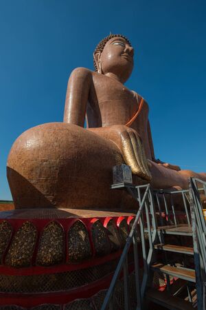Big buddha statue(Luang Por SomWang) at Wat Klang Bang Phra Temple, Nakhonpratom province, Thailand.の写真素材