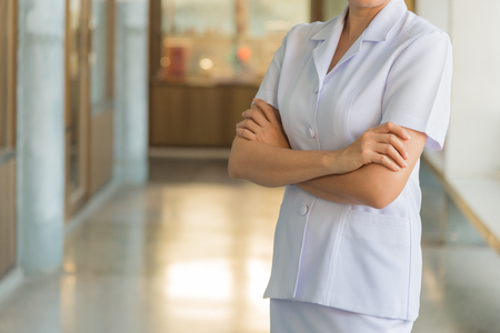 image of woman nurse in white coat portraitの写真素材