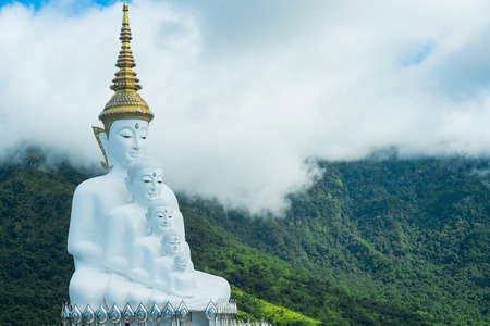 Phetchabun Province, Thailand - September 3, 2017: Five White Buddha statues sitting at Wat Pha Sorn Kaew Temple or Wat Phra Thart Pha Kaew Temple in Khao Kho, Phetchabun Province, Thailand.のeditorial素材
