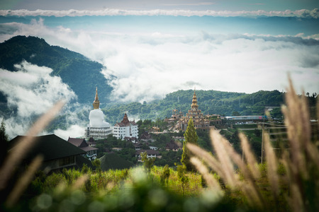 Phetchabun Province, Thailand - September 3, 2017: Big Buddha statue and pagoda on top of a hill with great views of the surrounding mountainous area at Wat Pha Sorn Kaew Temple or Wat Phra Thart Pha Kaew Temple in Khao Kho, Thailand. One of the most popuのeditorial素材