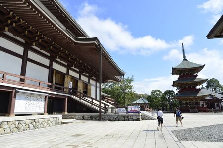 Narita, Japan - October 4, 2019: view of Naritasan temple with red pagoda and blue sky in Naritasan Shinshoji temple at Chiba Prefecture.のeditorial素材