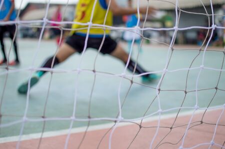 Blurred images of mesh feet and footballers who...の写真素材