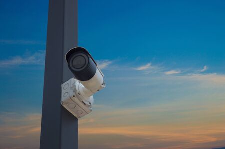 CCTV on the back of the pole is the evening sky To check safety