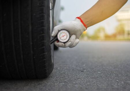 In mobile, a pressure measuring device for measuring tire pressure.の写真素材