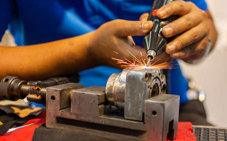 Welding sparks, fill steel, repair wear parts in the steel industry.の写真素材