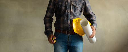 Construction supervisor: Concept of equipment preparation, readiness to control and inspect the work before construction. With writing area or designの写真素材