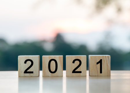 Wooden cube concept with numbers 2021, the beginning of the new yearの写真素材