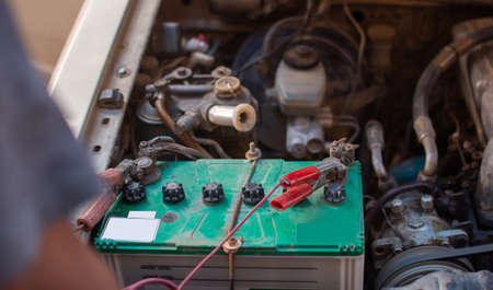 Charging old car batteries, maintenance for better use.の写真素材