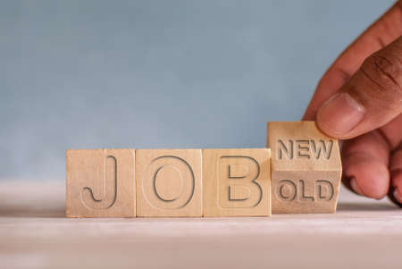 Wooden cube turner turns "old work" into "new work"の写真素材