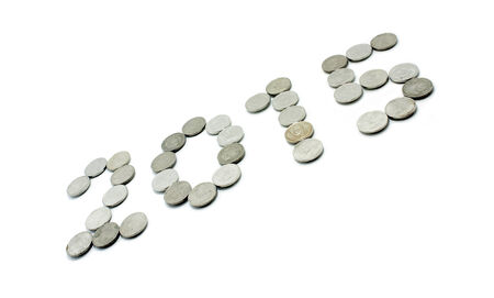 The coin is made of 2015 on white background.の写真素材