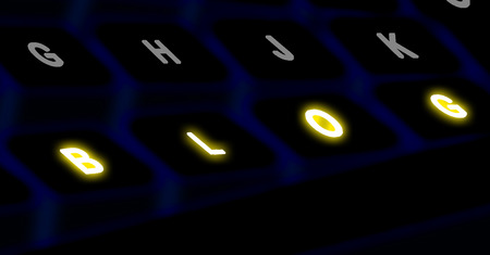 Computer black keyboard with blog button on black