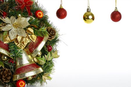 Wreath and Christmas tree hanging globes isolate on white backgroundの写真素材