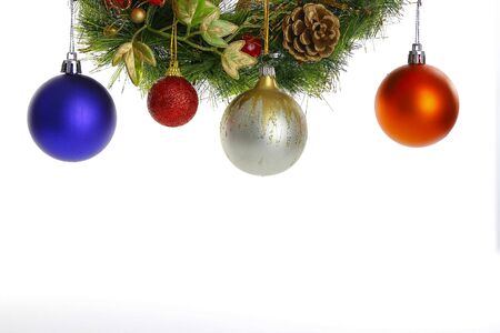 Globes hanging a Christmas wreath isolate on white backgroundの写真素材