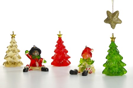 Winter scene of resin figurines on white backgroundの写真素材