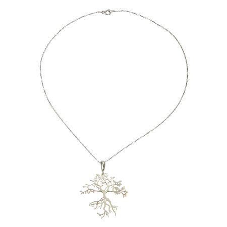 A silver chain with tree pendant on white backgroundの写真素材