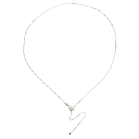 A silver chain with balls on white backgroundの写真素材