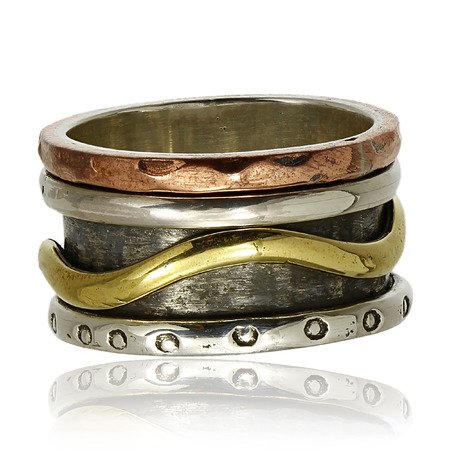 Copper and silver ring on a white backgroundの写真素材