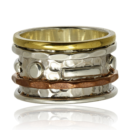 Copper and silver ring on a white backgroundの写真素材