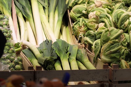 A seller who chooses fruits / vegetables in the supermarketの写真素材