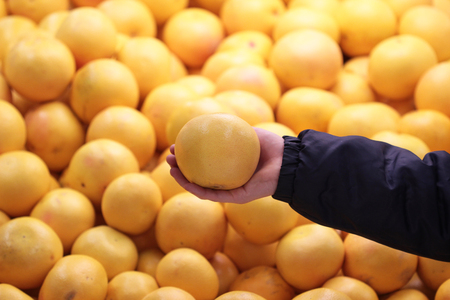 A seller who chooses a graphfruitの写真素材
