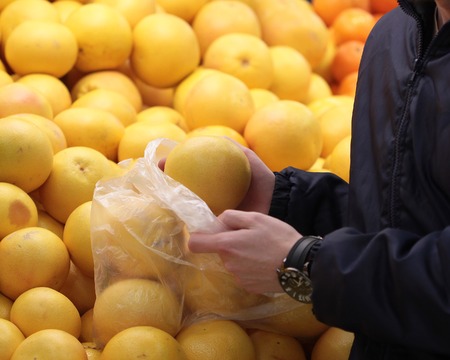 A seller who chooses a graphfruitの写真素材