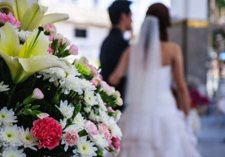 beautiful flowers and just married coupleの写真素材