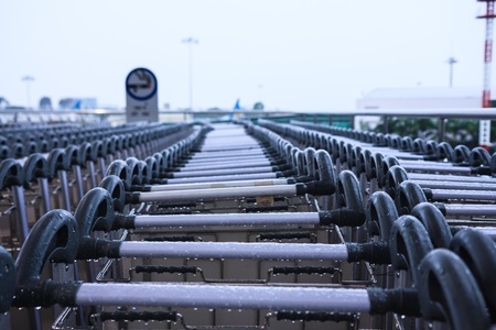 airport luggage carts lineup at ho chi minh airportのeditorial素材